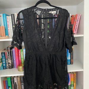 Cute lacey black romper